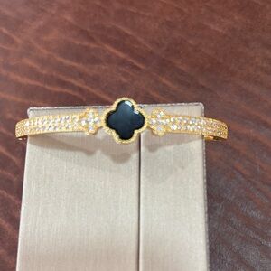 Elegant Gold and Black Bracelet